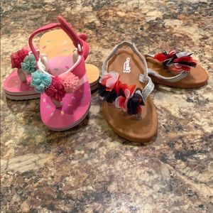 2 pair of flip flops. They are in great shape.